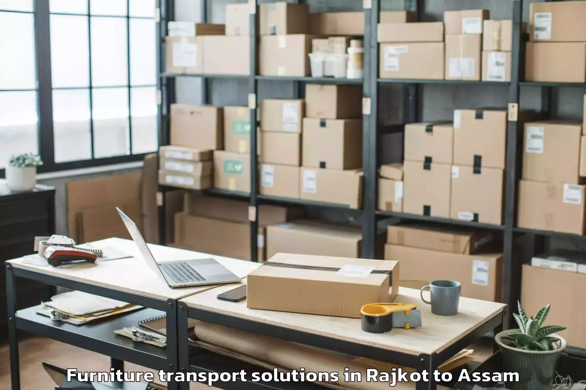 Book Rajkot to Baihata Furniture Transport Solutions Online